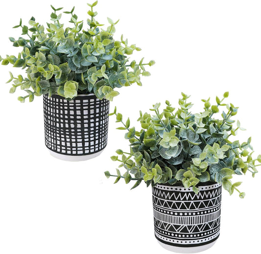Winlyn Set of 2 Small Artificial Potted Plants Faux Eucalyptus Plant in White Geometric Ceramic Pots Small Desk Potted Plants 7.1" Tall for Home Office Room Decorations Wedding Greenery Centerpiece