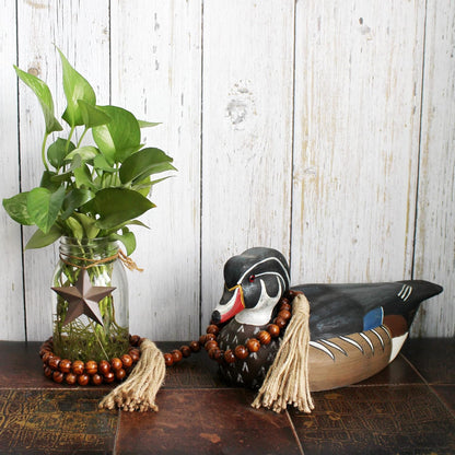 CVHOMEDECO. Wood Beads Garland with Tassels Farmhouse Rustic Wooden Prayer Bead String Wall Hanging Accent for Home Festival Decor. Mix Distressed