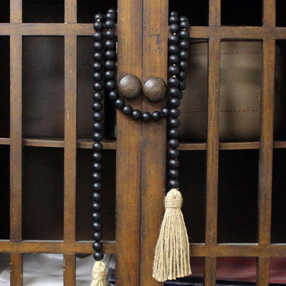 CVHOMEDECO. Wood Beads Garland with Tassels Farmhouse Rustic Wooden Prayer Bead String Wall Hanging Accent for Home Festival Decor. Mix Distressed