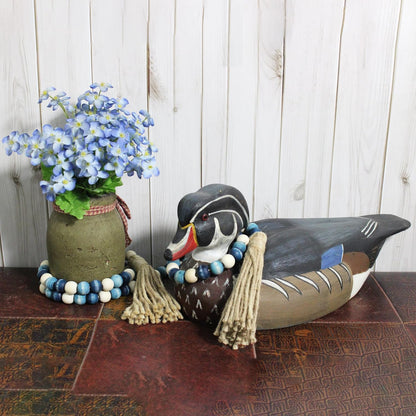 CVHOMEDECO. Wood Beads Garland with Tassels Farmhouse Rustic Wooden Prayer Bead String Wall Hanging Accent for Home Festival Decor. Mix Distressed