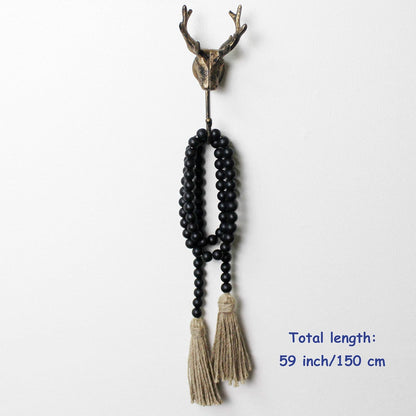 CVHOMEDECO. Wood Beads Garland with Tassels Farmhouse Rustic Wooden Prayer Bead String Wall Hanging Accent for Home Festival Decor. Mix Distressed