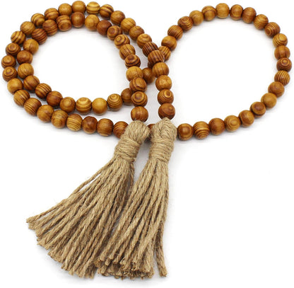 CVHOMEDECO. Wood Beads Garland with Tassels Farmhouse Rustic Wooden Prayer Bead String Wall Hanging Accent for Home Festival Decor. Mix Distressed
