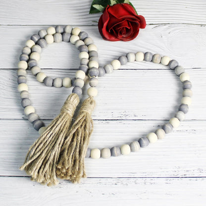 CVHOMEDECO. Wood Beads Garland with Tassels Farmhouse Rustic Wooden Prayer Bead String Wall Hanging Accent for Home Festival Decor. Mix Distressed