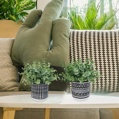Winlyn Set of 2 Small Artificial Potted Plants Faux Eucalyptus Plant in White Geometric Ceramic Pots Small Desk Potted Plants 7.1" Tall for Home Office Room Decorations Wedding Greenery Centerpiece