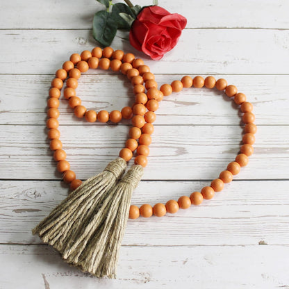 CVHOMEDECO. Wood Beads Garland with Tassels Farmhouse Rustic Wooden Prayer Bead String Wall Hanging Accent for Home Festival Decor. Mix Distressed