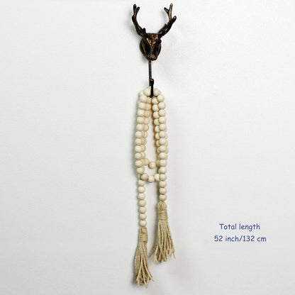 CVHOMEDECO. Wood Beads Garland with Tassels Farmhouse Rustic Wooden Prayer Bead String Wall Hanging Accent for Home Festival Decor. Mix Distressed