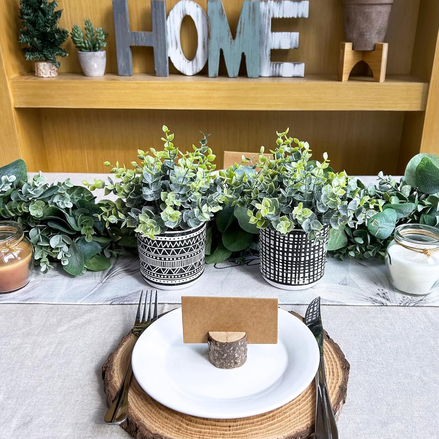 Winlyn Set of 2 Small Artificial Potted Plants Faux Eucalyptus Plant in White Geometric Ceramic Pots Small Desk Potted Plants 7.1" Tall for Home Office Room Decorations Wedding Greenery Centerpiece