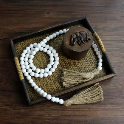 CVHOMEDECO. Wood Beads Garland with Tassels Farmhouse Rustic Wooden Prayer Bead String Wall Hanging Accent for Home Festival Decor. Mix Distressed