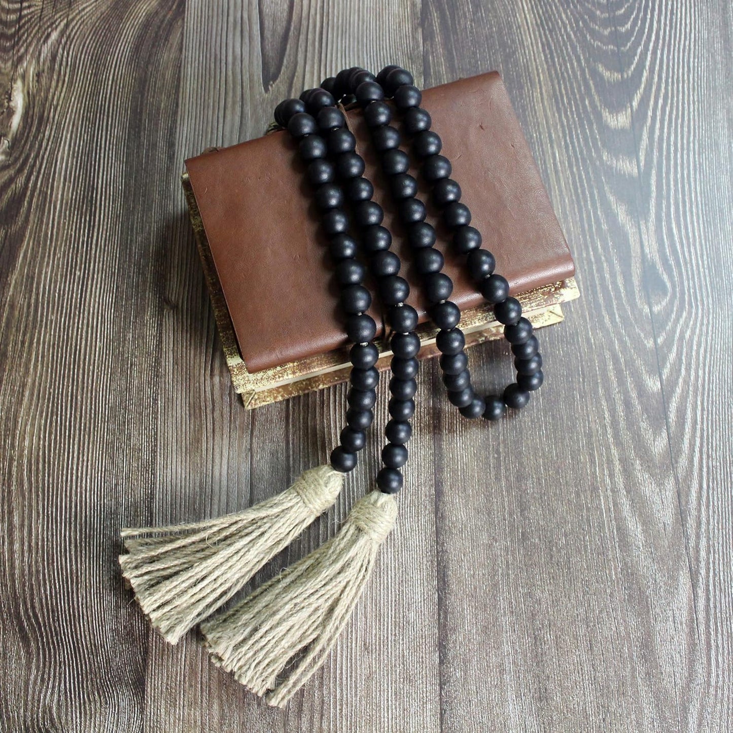 CVHOMEDECO. Wood Beads Garland with Tassels Farmhouse Rustic Wooden Prayer Bead String Wall Hanging Accent for Home Festival Decor. Mix Distressed