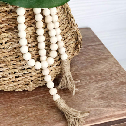 CVHOMEDECO. Wood Beads Garland with Tassels Farmhouse Rustic Wooden Prayer Bead String Wall Hanging Accent for Home Festival Decor. Mix Distressed
